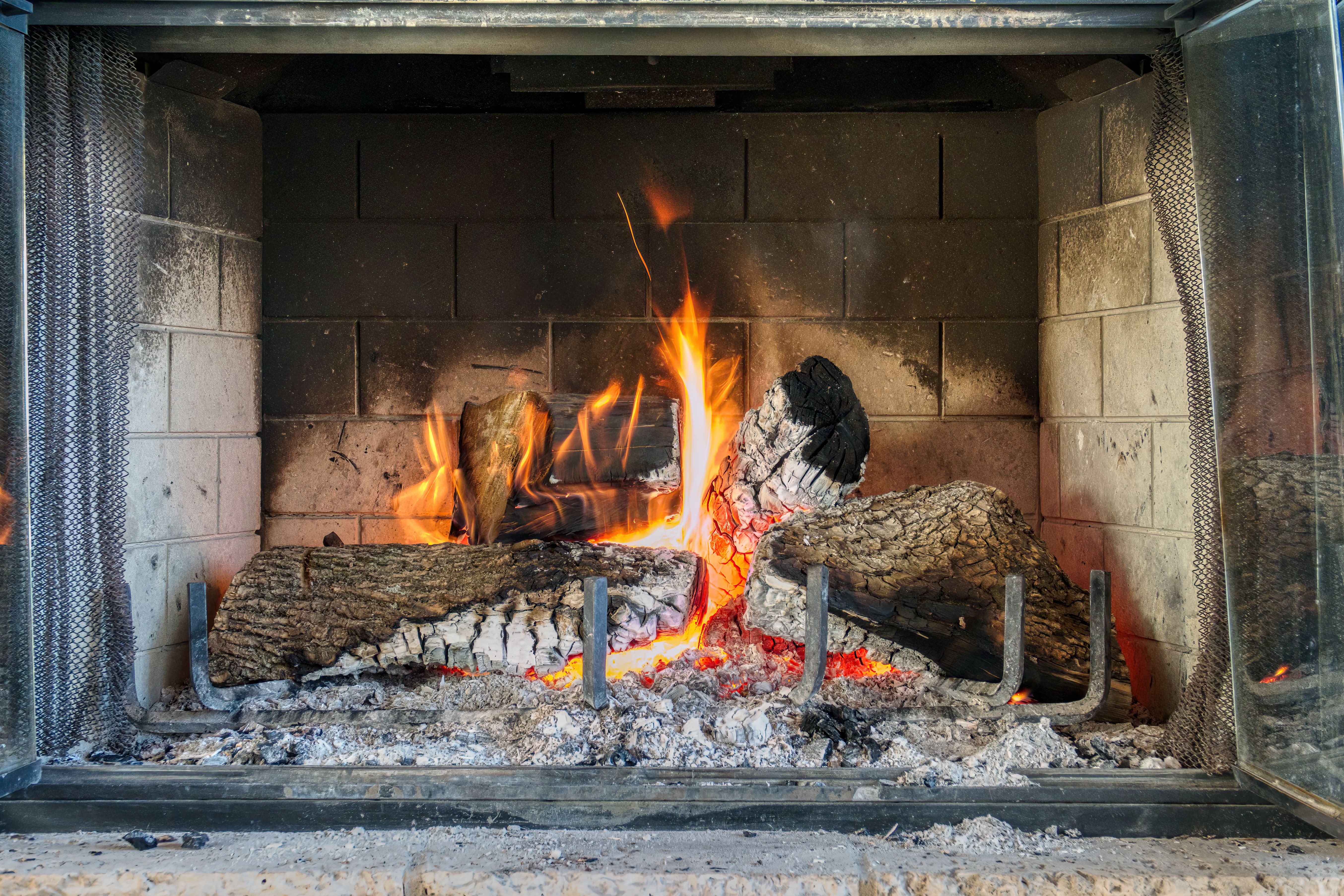Professional chimney service technician at work